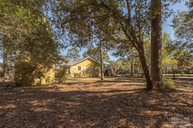 view of yard featuring fence