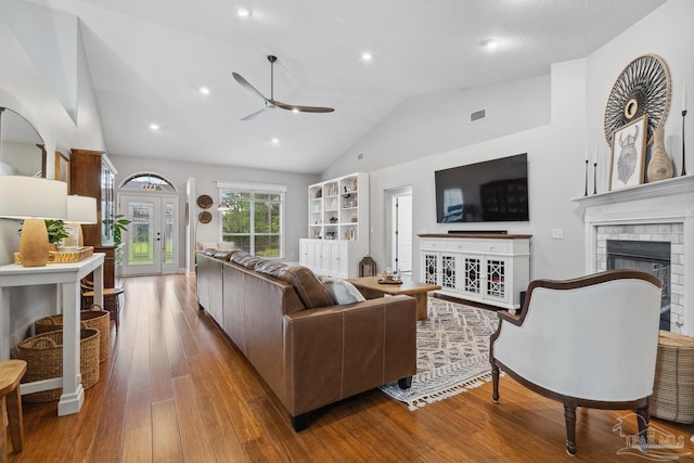 1333 Dubose Rd, Gulf Breeze, FL 32563 - living room with ceiling fan, wood finished floors, a brick fireplace, and high vaulted ceiling