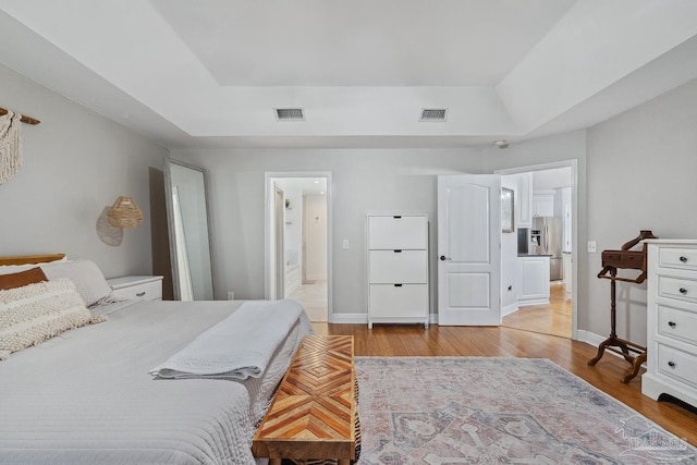 1333 Dubose Rd, Gulf Breeze, FL 32563 - bedroom featuring light wood-style floors, baseboards, and ensuite bath