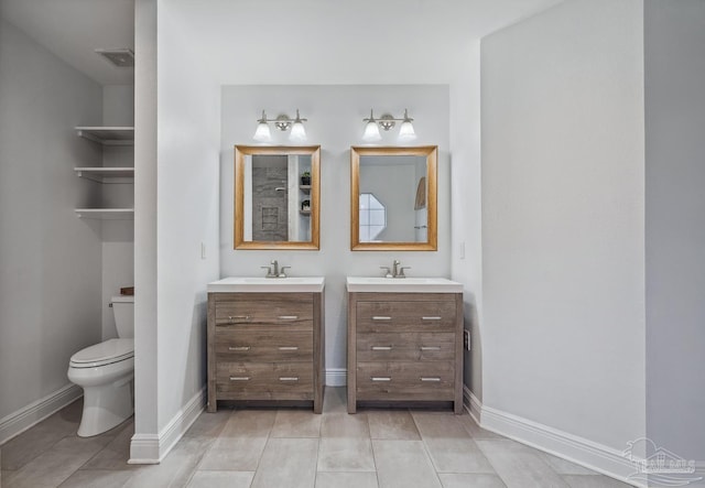 1333 Dubose Rd, Gulf Breeze, FL 32563 - bathroom featuring vanity, baseboards, and toilet