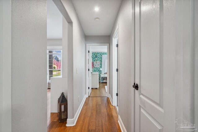 1333 Dubose Rd, Gulf Breeze, FL 32563 - corridor with light wood-style floors and baseboards