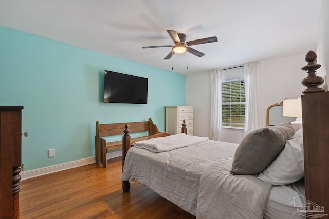 1333 Dubose Rd, Gulf Breeze, FL 32563 - bedroom with wood finished floors, baseboards, and ceiling fan