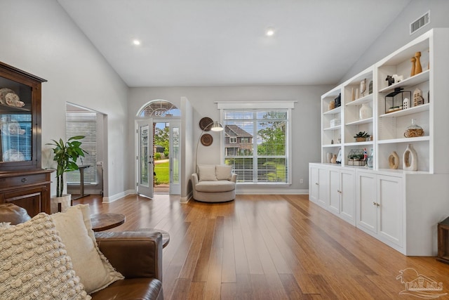 1333 Dubose Rd, Gulf Breeze, FL 32563 - sitting room featuring vaulted ceiling, light wood-style flooring, baseboards, and recessed lighting