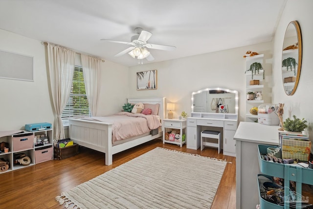 1333 Dubose Rd, Gulf Breeze, FL 32563 - bedroom with wood finished floors and a ceiling fan