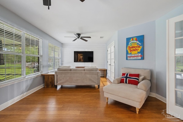 1333 Dubose Rd, Gulf Breeze, FL 32563 - living area featuring ceiling fan, baseboards, and wood finished floors