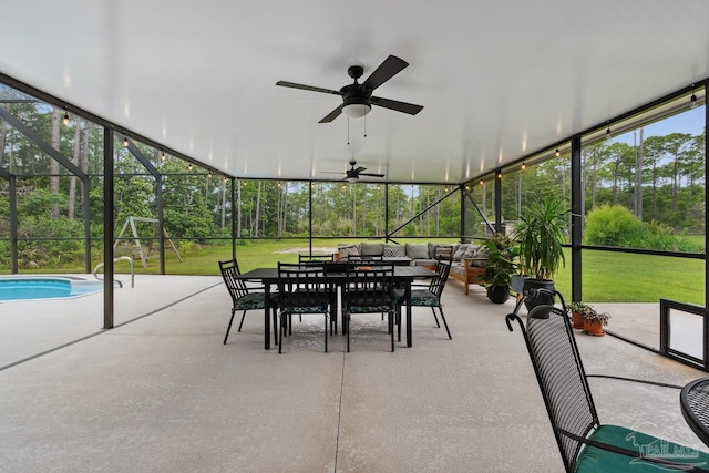 1333 Dubose Rd, Gulf Breeze, FL 32563 - sunroom / solarium featuring ceiling fan, outdoor dining area, outdoor lounge area, and view of scattered trees