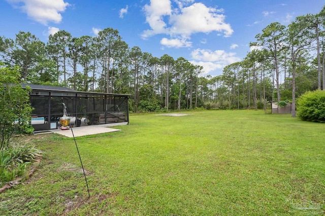 1333 Dubose Rd, Gulf Breeze, FL 32563 - view of green lawn featuring a sunroom