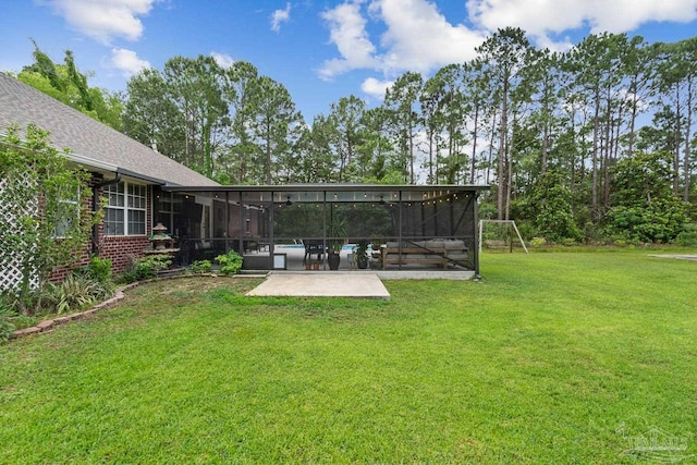 1333 Dubose Rd, Gulf Breeze, FL 32563 - view of grassy yard featuring a patio, a swimming pool, and a sunroom