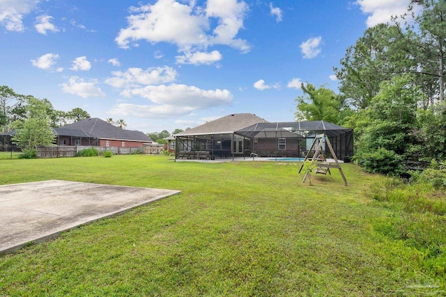 1333 Dubose Rd, Gulf Breeze, FL 32563 - view of yard featuring an outdoor pool, a lanai, and a patio area