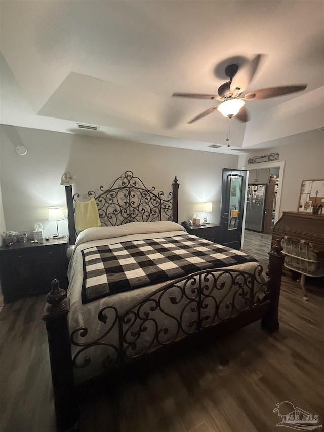 5407 Maverick Ln, Gulf Breeze, FL 32563 - bedroom featuring wood finished floors, ceiling fan, and visible vents