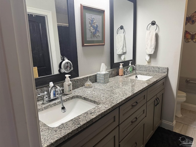 5407 Maverick Ln, Gulf Breeze, FL 32563 - full bath featuring toilet, double vanity, and a sink
