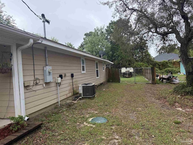 5407 Maverick Ln, Gulf Breeze, FL 32563 - exterior space with central air condition unit and fence