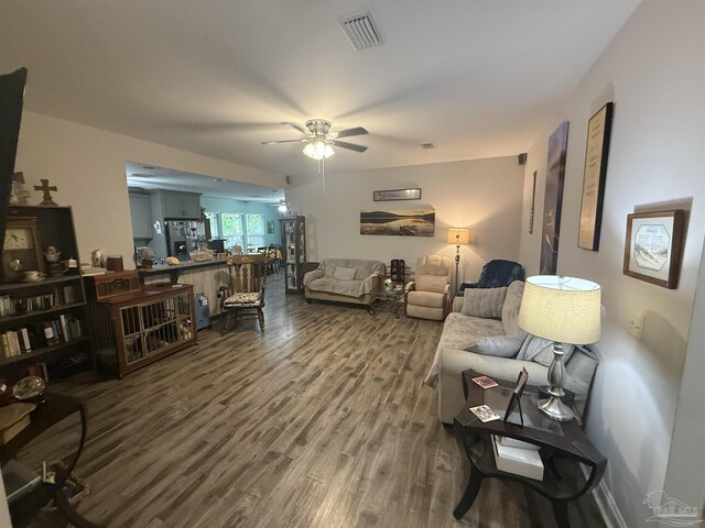 5407 Maverick Ln, Gulf Breeze, FL 32563 - living room featuring wood finished floors, ceiling fan, and visible vents