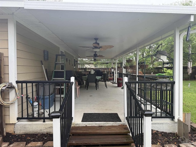 5407 Maverick Ln, Gulf Breeze, FL 32563 - view of patio with ceiling fan, fence, and outdoor dining area