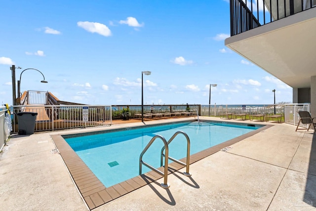 view of pool with a patio