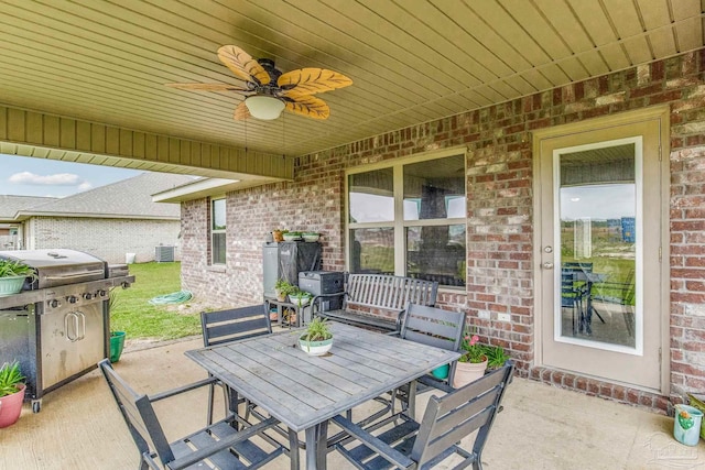view of patio / terrace with area for grilling and ceiling fan