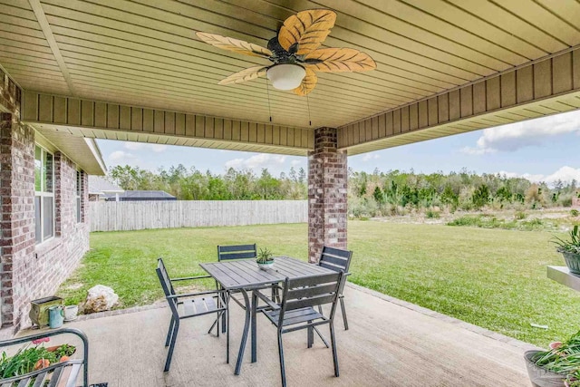 view of patio featuring ceiling fan
