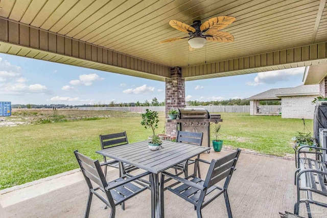 view of patio / terrace featuring a rural view and ceiling fan