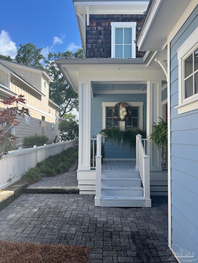 16 Duncan Ave, Gulf Breeze, FL 32561 - view of exterior entry with covered porch