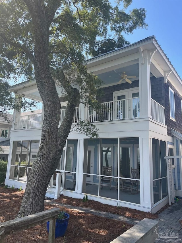 16 Duncan Ave, Gulf Breeze, FL 32561 - view of side of property featuring a balcony and a sunroom