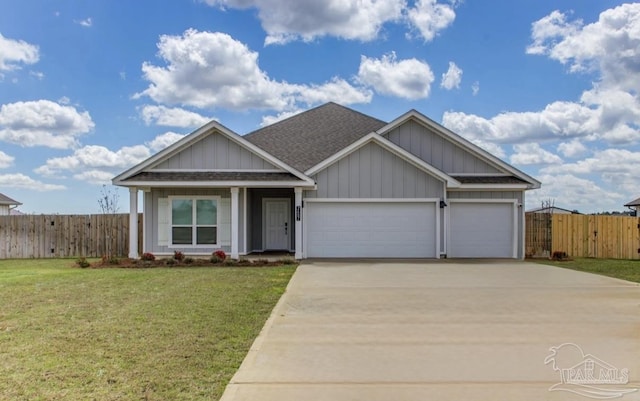 view of front of house featuring a front yard, roof with shingles, concrete driveway, fence, and an attached garage