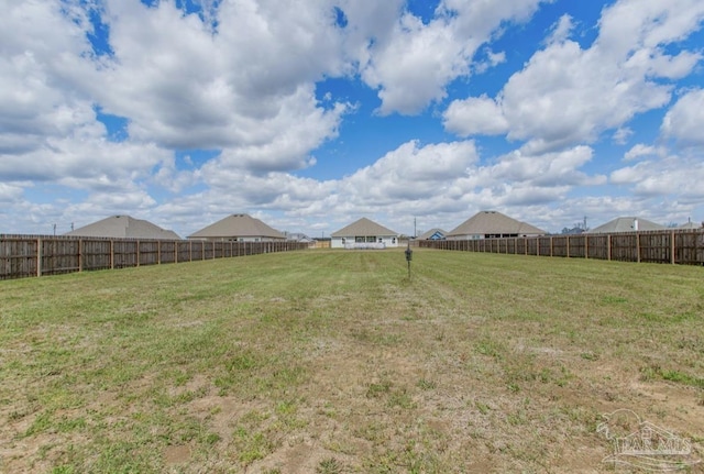 view of yard featuring fence