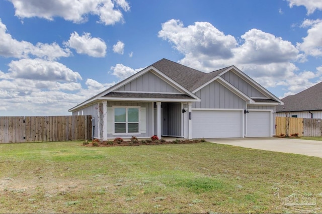 view of front of house featuring fence, an attached garage, board and batten siding, driveway, and a front yard