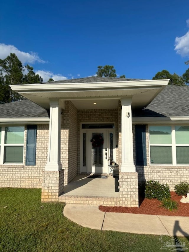 entrance to property with covered porch