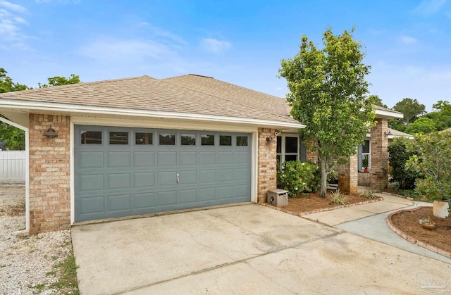 1265 Grand Ridge Cir, Gulf Breeze, FL 32563 - single story home featuring brick siding, concrete driveway, an attached garage, and roof with shingles