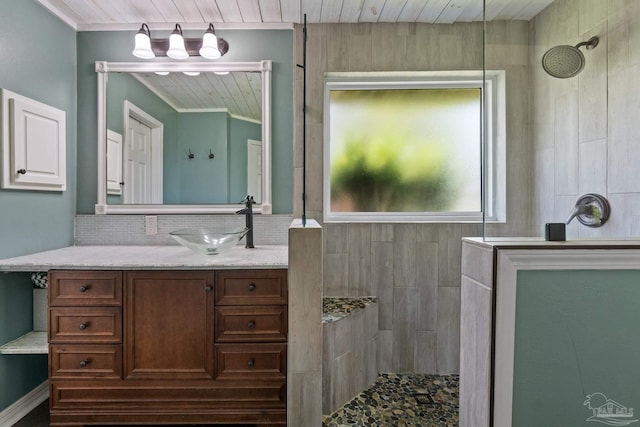 1265 Grand Ridge Cir, Gulf Breeze, FL 32563 - full bathroom with a walk in shower, vanity, backsplash, wood ceiling, and crown molding