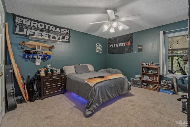 1265 Grand Ridge Cir, Gulf Breeze, FL 32563 - carpeted bedroom featuring a textured ceiling and a ceiling fan