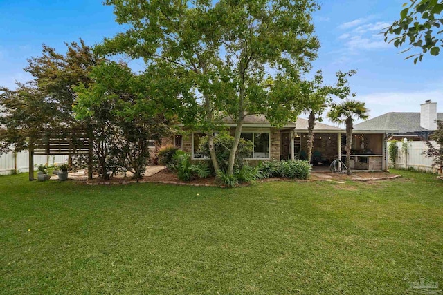 1265 Grand Ridge Cir, Gulf Breeze, FL 32563 - rear view of house featuring a sunroom