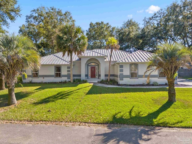 view of front facade with a front yard