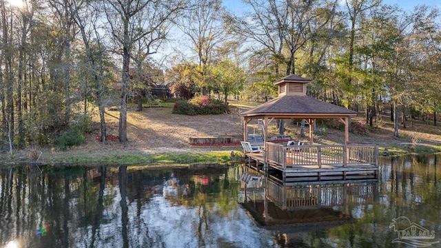 view of dock featuring a water view and a gazebo