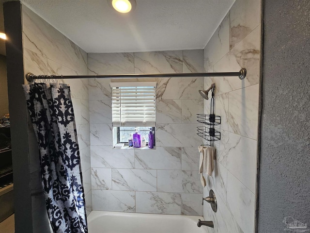 bathroom with shower / bathtub combination with curtain