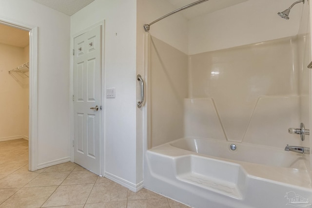 bathroom featuring shower / bathtub combination and tile patterned floors