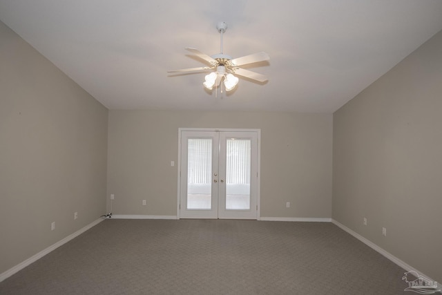 spare room featuring a ceiling fan, french doors, baseboards, and dark carpet