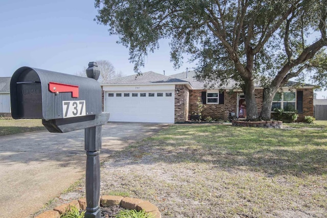 ranch-style home featuring brick siding, a front lawn, concrete driveway, a chimney, and a garage