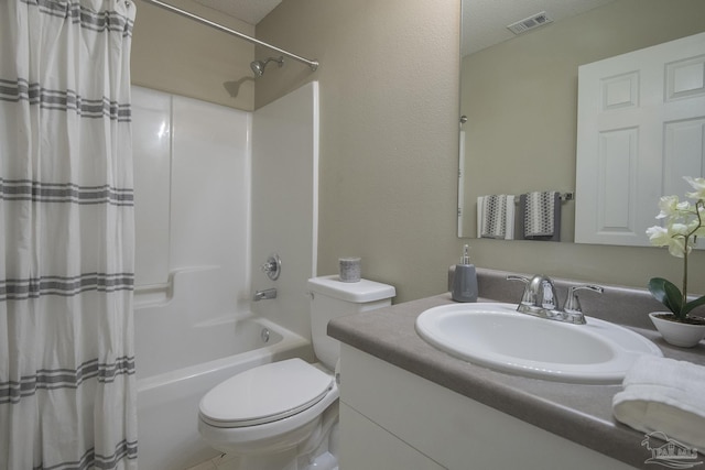 full bathroom featuring toilet, shower / bath combo with shower curtain, vanity, and visible vents