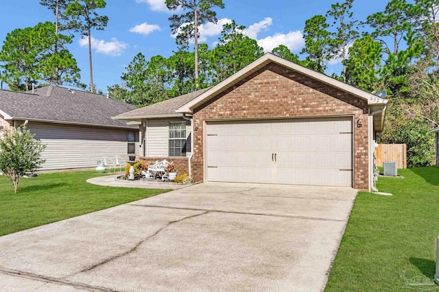 ranch-style house featuring a garage, a front yard, and cooling unit