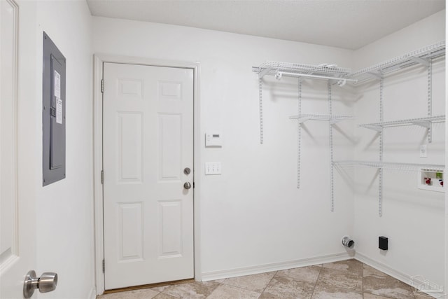 laundry area featuring hookup for a washing machine and electric panel