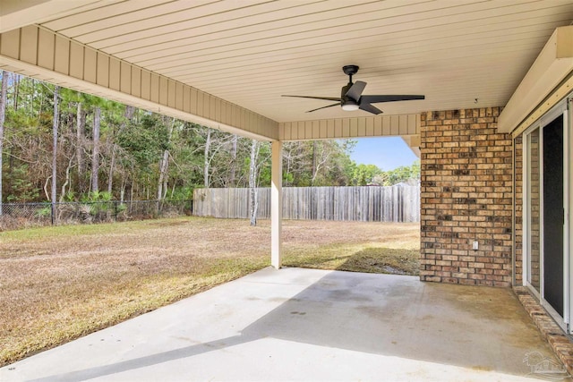 view of patio featuring ceiling fan