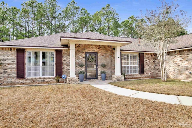 ranch-style house with a front yard