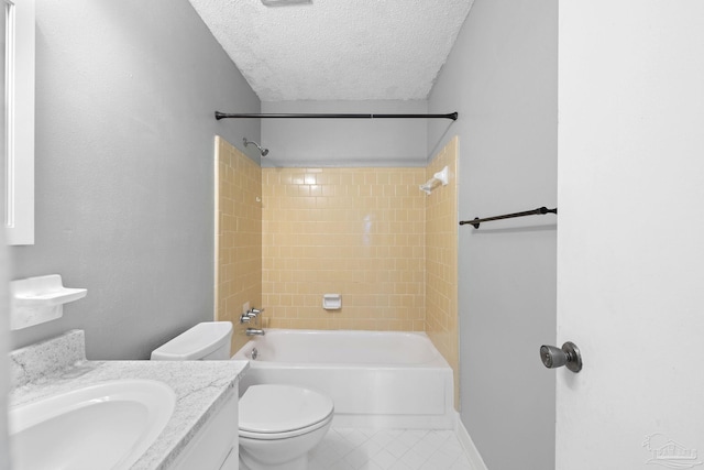 full bathroom featuring toilet, shower / tub combination, tile patterned floors, a textured ceiling, and vanity