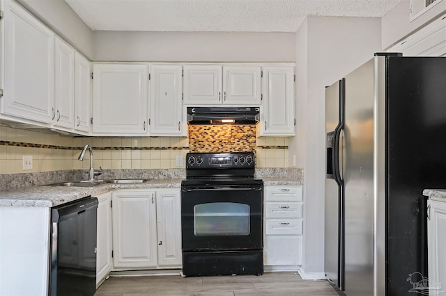 2811 Langley Ave Unit 221, Pensacola, FL 32504 - kitchen with stainless steel refrigerator with ice dispenser, black electric range, dishwashing machine, under cabinet range hood, and white cabinets