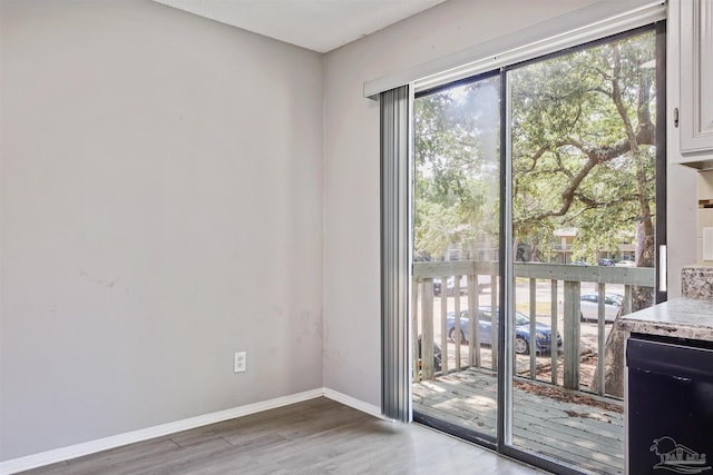 2811 Langley Ave Unit 221, Pensacola, FL 32504 - empty room featuring wood finished floors and baseboards
