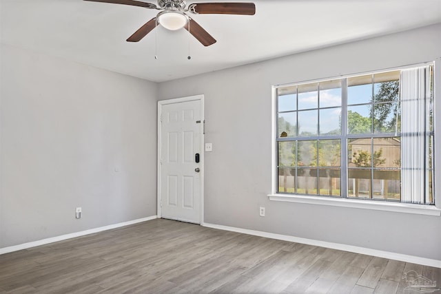 2811 Langley Ave Unit 221, Pensacola, FL 32504 - spare room with wood finished floors, baseboards, and ceiling fan