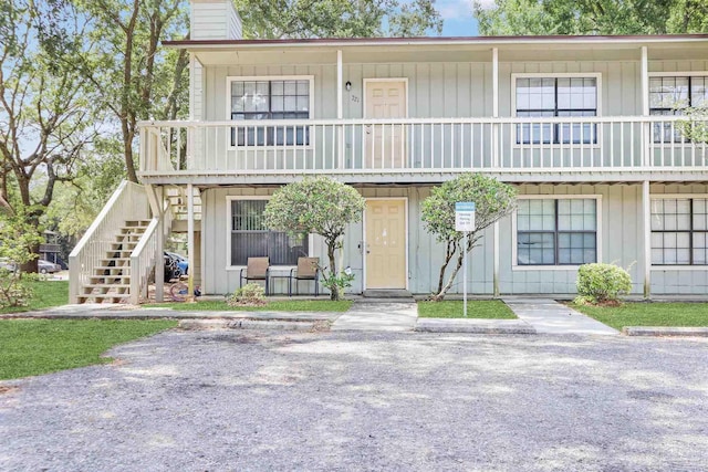 2811 Langley Ave Unit 221, Pensacola, FL 32504 - view of front of property with stairway and a chimney