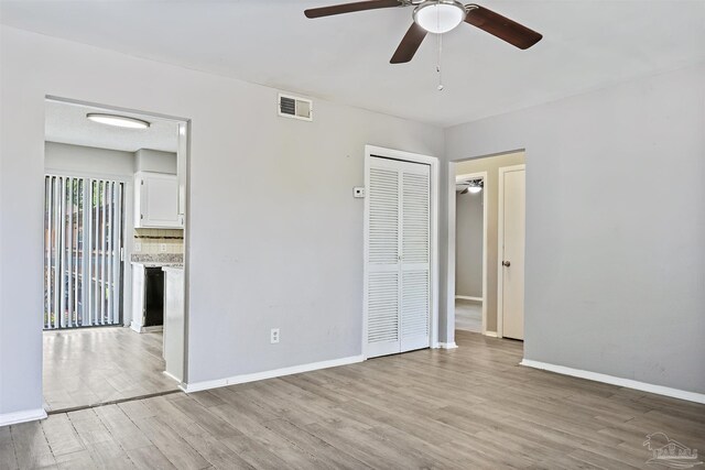 2811 Langley Ave Unit 221, Pensacola, FL 32504 - empty room featuring ceiling fan, light wood-type flooring, and baseboards