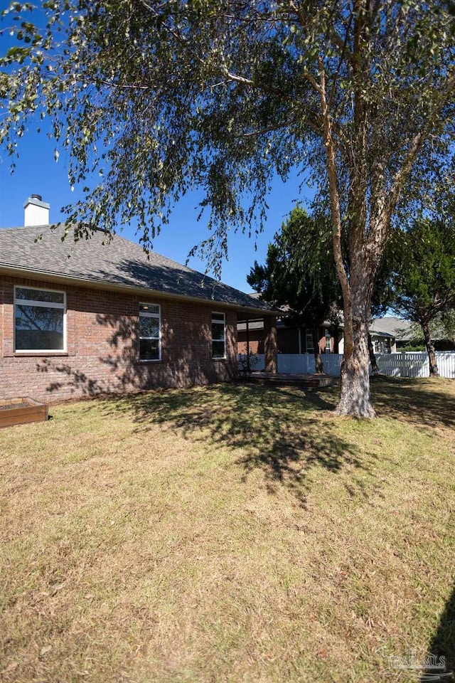 view of yard with fence